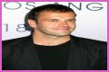 Jonny Lee Miller flashes ink for Ellen charity